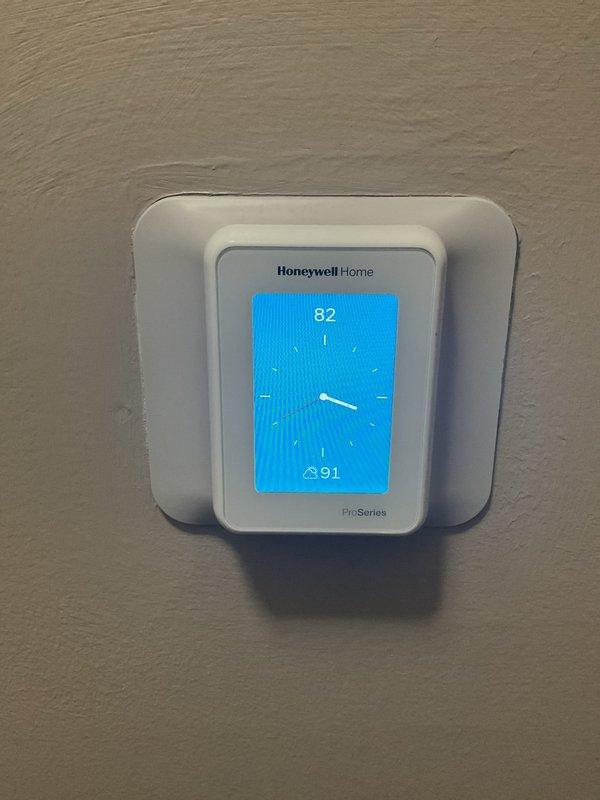 Responded to no-cool complaint on upstairs HVAC system with intermittent shutdown issues. Inspected Platinum brand outdoor condenser unit and Honeywell ProSeries thermostat showing 82°F setpoint with 91°F actual temperature. Diagnosed system cycling issue causing inadequate cooling and temperature rise throughout the day. Performed necessary repairs to restore proper system operation and verified unit maintains consistent cooling cycle. Upstairs system now functioning normally with proper temperature control restored.