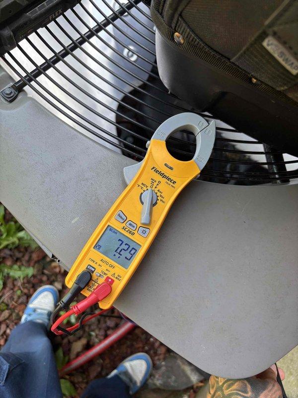 # HVAC Maintenance Service Completed

Performed planned maintenance visit on a 3-year-old single-system residential HVAC unit. Conducted comprehensive system inspection including electrical current measurements showing 72.9 amp draw on the outdoor condensing unit. Serviced condenser fan motor assembly with appropriate lubrication and performed routine maintenance procedures on the outdoor unit. System operational and running within normal parameters upon completion.