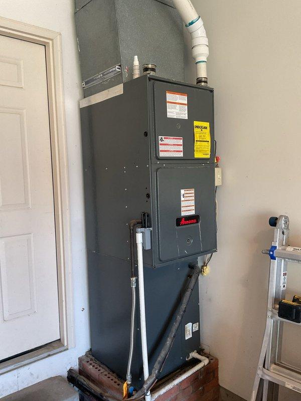 # HVAC Repair - No Cooling Issue Resolved

Responded to service call for 16-year-old residential air conditioning system with cooling failure. Customer reported compressor running and air handler blowing but no cold air production.

## Diagnostic Findings

Performed comprehensive system evaluation on aging split-system HVAC unit. Confirmed compressor operation and airflow from indoor air handler. Measured supply air temperature and verified inadequate cooling capacity. Inspected outdoor condenser unit positioned at exterior brick wall location. 

Tested electrical components, refrigerant pressures, and airflow characteristics. Identified loss of refrigerant charge as primary failure cause. Located refrigerant leak in system requiring repair. Assessed condenser coil condition and fan motor operation.

## Repairs Completed

Isolated refrigerant leak point and performed necessary repairs to restore system integrity. Evacuated remaining refrigerant from system following EPA guidelines. Com