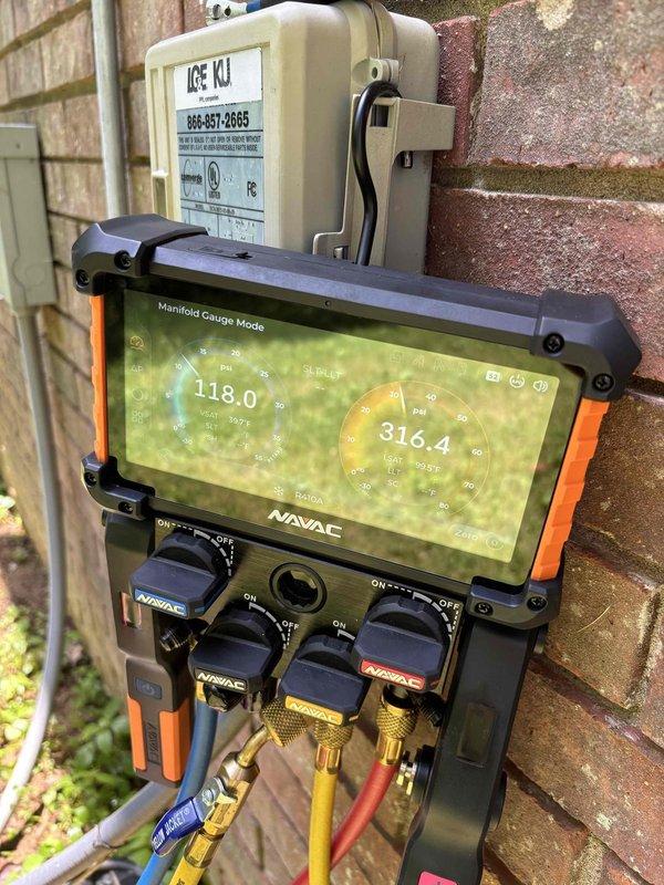 Responded to no cooling complaint on 15-year-old residential HVAC system with thermostat set to 72°F but indoor temperature reaching 75°F. Upon arrival, confirmed system was off and not maintaining setpoint temperature. Performed comprehensive diagnostic evaluation of outdoor condensing unit and refrigeration circuit using digital manifold gauges and temperature measurement equipment. Measured system pressures revealing suction pressure of 118.0 psig and discharge pressure of 316.4 psig, with suction line temperature reading 57.7°F at outdoor unit. Pressure and temperature readings indicated potential refrigerant charge issues or system inefficiency typical of aging equipment. Inspected electrical control components housed in outdoor disconnect box and verified power supply integrity with no tripped breakers reported. Evaluated overall system performance and provided assessment of 15-year-old unit's operational status and cooling capacity limitations.