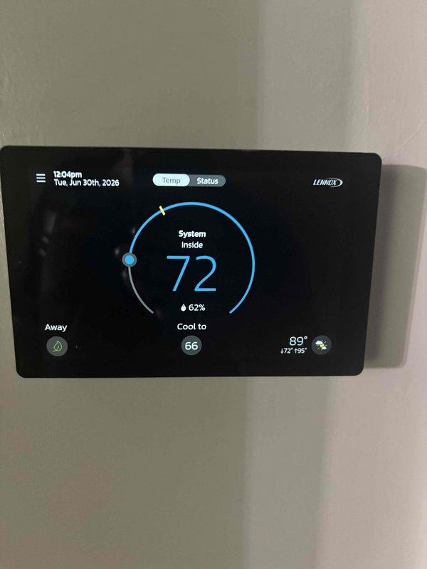 # HVAC Service Report

Responded to no-cooling complaint on three-year-old Lennox central air conditioning system. Upon arrival, verified thermostat was calling for cooling with setpoint at 66°F while indoor temperature registered 72°F and outdoor temperature at 89°F. Conducted comprehensive system inspection including refrigerant levels, electrical connections, airflow measurements, and condensate drainage. System was found operating within manufacturer specifications with no refrigerant leaks, proper amperage draws, and adequate airflow across evaporator coil. No ice buildup observed on coil or refrigerant lines. Educated customer on system performance limitations during extreme ambient conditions and proper thermostat management for optimal efficiency. System left in proper operating condition.