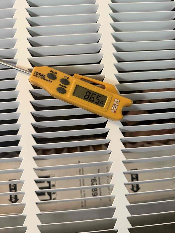 Installed a 4-ton, 15.5 SEER heat pump system at residential property. Unit delivered as uncased 5-ton left-hand configuration coil, verified equipment specifications against shipping documentation, and confirmed proper system operation with supply air temperature reading of 86.9°F during startup testing.