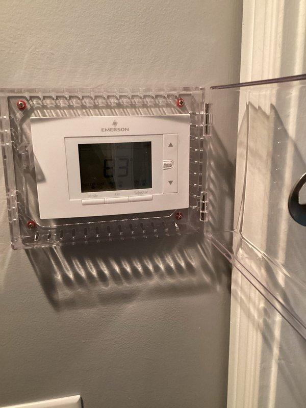 Responded to no-cooling call on 15-year-old residential HVAC system running continuously without achieving setpoint. Upon arrival, found unit unable to maintain 75°F setpoint with indoor temperature at 78°F. Performed comprehensive system diagnostics including thermostat operation verification, electrical connections inspection, and control wiring assessment. Documented existing Emerson digital thermostat installation and terminal connections for reference. System evaluated for proper communication between thermostat and air handler. Identified cooling system deficiency preventing adequate temperature drop despite continuous operation.