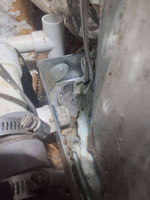 Responded to callback for unit not cooling properly. Upon inspection, discovered extensive corrosion and rust throughout the system components, including deteriorated metal ductwork housing and compromised drainage piping. Documented severe moisture damage, mineral deposits, and debris accumulation affecting mechanical assembly performance, indicating prolonged exposure to water intrusion and lack of preventative maintenance requiring further evaluation and repair recommendations.