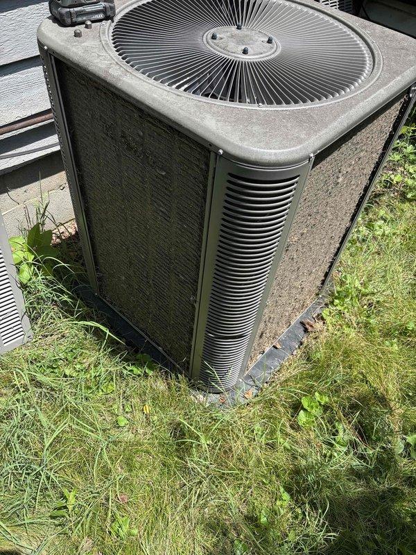 Responded to no cooling complaint on central air conditioning system previously installed by our company. Upon arrival, performed diagnostic testing using digital manifold gauge set to measure refrigerant pressures and temperatures. Low side pressure reading of 127.6 and high side pressure reading of 290.1 were recorded, indicating potential refrigerant charge issues or system performance concerns. Conducted visual inspection of outdoor condenser unit, which showed normal operation with no visible ice buildup on coils or refrigerant lines. Unit exterior displayed typical weathering consistent with outdoor installation. All diagnostic readings and equipment conditions were documented with photographs for service records. Homeowner was advised of findings and system status, with notation made regarding extended warranty coverage for any necessary repairs.