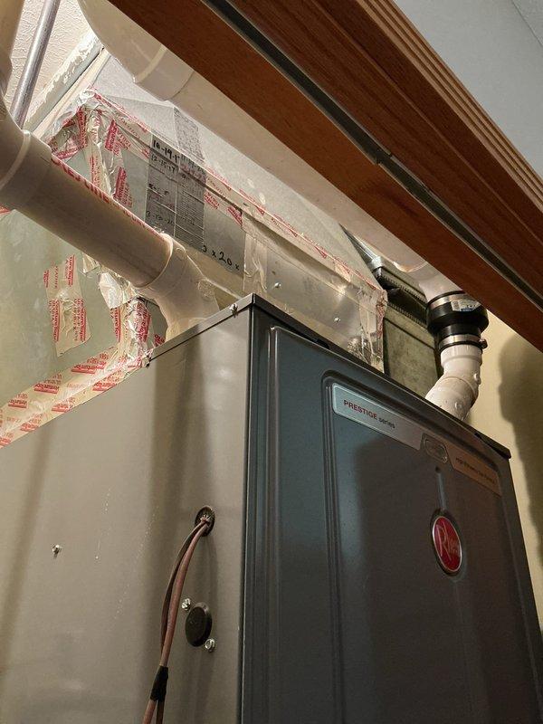 Responded to no cooling complaint on 9-year-old Rheem Prestige Series system that had been running continuously for three days with thermostat set to 70°F while indoor temperature reached 82°F. Upon arrival, confirmed weak airflow from supply vents with no ice buildup present and no tripped breakers. Performed diagnostic evaluation of furnace and air handler installed in utility closet, inspecting blower assembly, evaporator coil accessibility, and condensate drainage system. Assessed outdoor condensing unit operation, refrigerant pressures, and electrical connections. Identified root cause of cooling failure and presented repair options to restore proper system operation and adequate airflow.