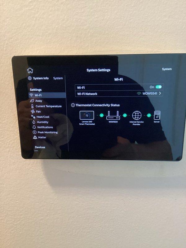 Completed annual Platinum Level maintenance on single-system residential HVAC unit installed in April 2024. Replaced 20x20x5 air filter, verified thermostat connectivity and Wi-Fi network configuration showing proper communication between device, router, and server, and performed standard system diagnostics. All equipment operating within manufacturer specifications with proper leveling confirmed on unit components.