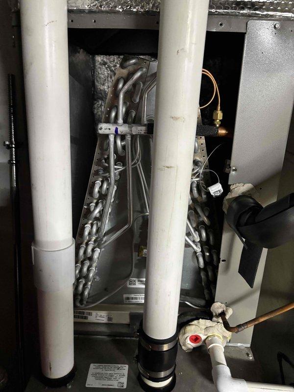 Completed second annual platinum level maintenance on HVAC system. Performed comprehensive inspection of evaporator coil assembly, heat exchanger components, and refrigerant lines. Verified system operation, checked refrigerant pressures using digital gauges, and inspected all electrical connections and wiring. Examined PVC condensate drain lines for proper flow and drainage. All components found operating within normal parameters. System is functioning properly and ready for continued service.