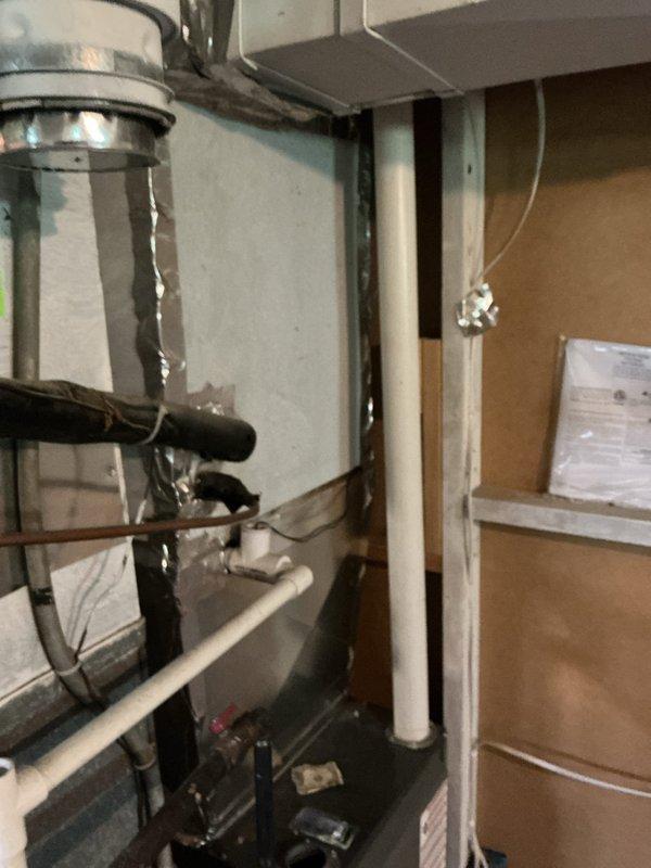 Responded to no cooling complaint on 5-year-old residential system with ice buildup on evaporator coil and suspected refrigerant leak. Upon arrival, confirmed ice formation on indoor coil and low cooling performance; previous technician had added refrigerant without locating leak source. Performed comprehensive leak detection using electronic leak detector and identified active refrigerant leak in evaporator coil assembly. Recovered remaining refrigerant from system per EPA regulations. Recommended evaporator coil replacement due to leak location being non-repairable. Provided detailed estimate for coil replacement, proper refrigerant recharge, system evacuation, and leak verification testing to restore system to manufacturer specifications.