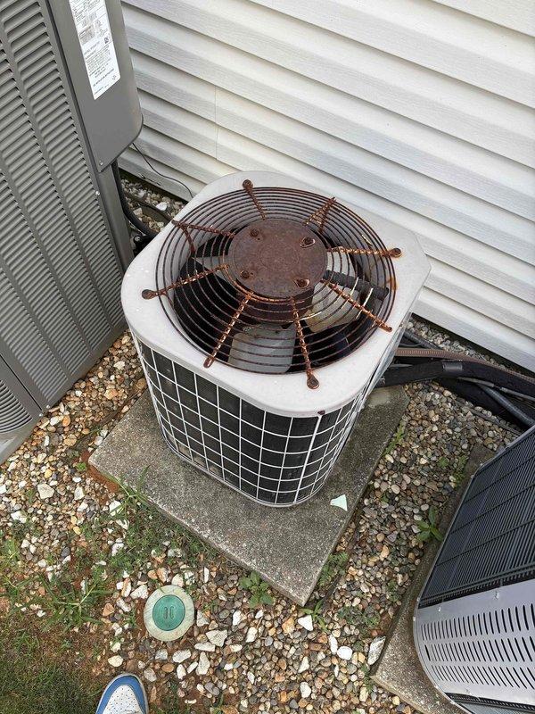 Completed comprehensive replacement estimate for residential HVAC system. Evaluated existing outdoor condensing unit showing significant weathering and oxidation on copper components, along with indoor air handler installation in utility closet with aging flexible ductwork and associated drainage systems. Documented current equipment condition, assessed installation location accessibility, and provided homeowner with complete system replacement options to address non-functional heating and cooling equipment.