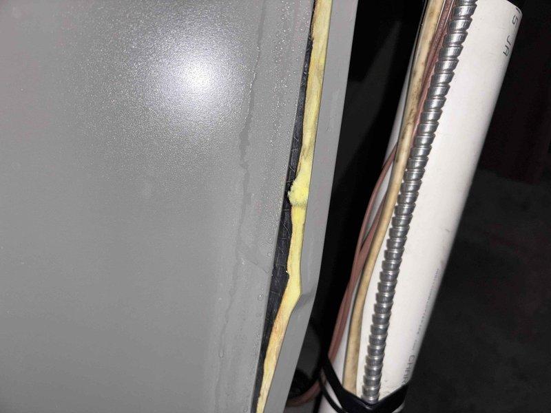 Completed callback service to address air leakage issues in supply plenum system causing inadequate cooling performance. Sealed gaps and joints in sheet metal ductwork using professional-grade foil tape to eliminate air loss. Addressed severe condensation and ice buildup on horizontal supply duct run, indicating previous air leakage allowing humid air infiltration into cold plenum space. Inspected refrigerant lines and insulation integrity at penetration points. Coordinated with management regarding ongoing temperature control concerns and verified system airflow improvements following repairs.