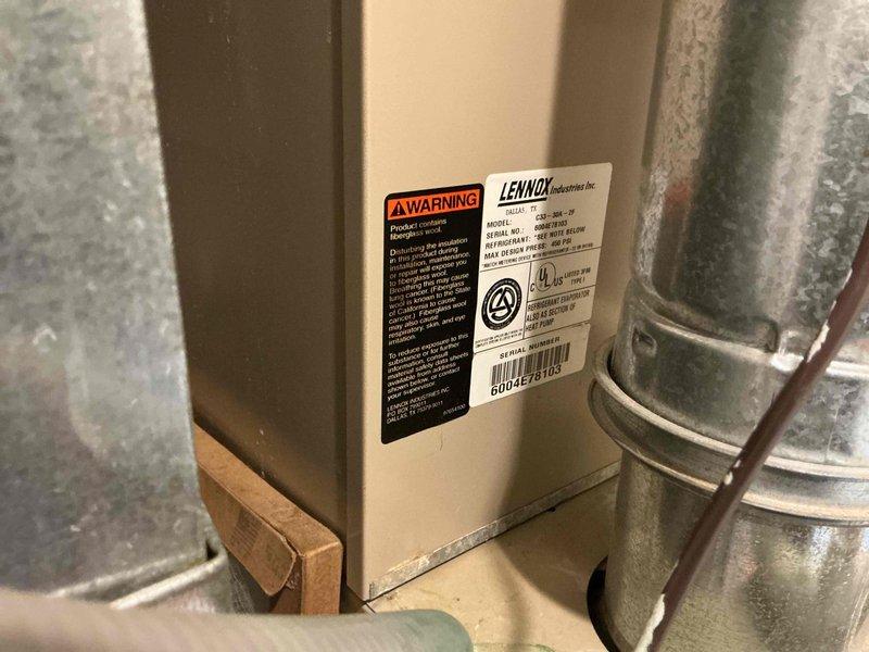 Completed comprehensive replacement estimate for residential property with three HVAC systems, focusing on one non-operational 21-year-old unit requiring full system replacement. Evaluated existing Lennox equipment installation in utility closet, including air handler with cylindrical plenum, flexible ductwork connections, electrical service, and PVC condensate drainage system. Documented current system configuration and provided replacement options per homeowner request for equipment upgrade only.