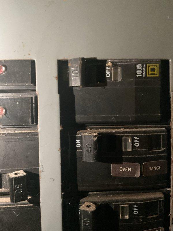 Conducted comprehensive HVAC system replacement estimate for non-functioning residential air conditioning system. Evaluated existing outdoor condenser unit positioned against brick exterior, assessed electrical panel capacity including dedicated circuit breaker configuration for HVAC equipment, and documented current system installation including concrete pad placement and clearance conditions with surrounding vegetation. Provided homeowner with complete replacement options and specifications for new system installation.