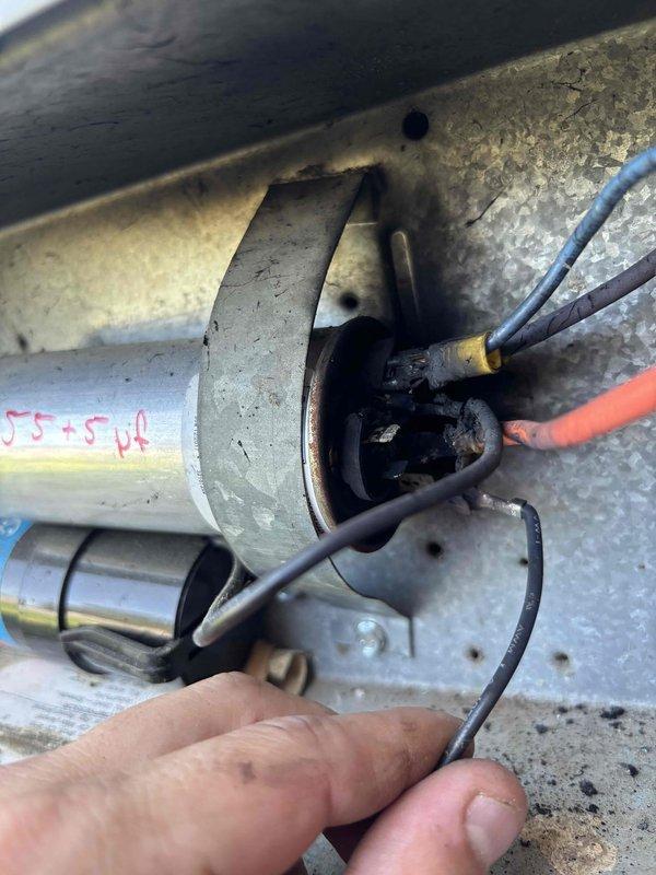 Responded to no cooling complaint on 7-year-old residential HVAC system with breaker tripping issue and no airflow. Upon arrival, found thermostat reading 78°F with indoor temperature at 92°F. System would run approximately 30 seconds after resetting breaker before shutting down again. Performed diagnostic evaluation and identified failed dual run capacitor as root cause of system shutdown. Capacitor showed visible signs of failure and tested outside acceptable microfarad range. Removed defective capacitor from outdoor condensing unit and installed new dual run capacitor with proper specifications. Verified all electrical connections were secure and tested system operation. Unit now running properly with normal amperage draw on compressor and condenser fan motor. System cooling effectively with adequate airflow restored throughout home.