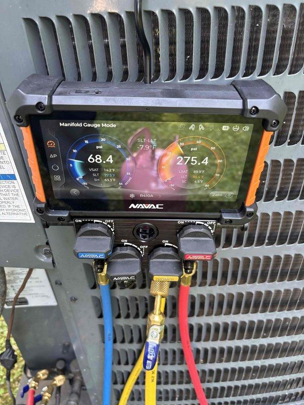 Responded to callback for inadequate cooling on 5-year-old AC system. Connected digital manifold gauges to measure refrigerant pressures, recording 68.4 PSI suction and 275.4 PSI discharge with suction line temperature of -7.9°F. Verified airflow at floor register measuring 53.3°F supply air temperature. Diagnosed and addressed cooling deficiency to restore proper system operation throughout home.