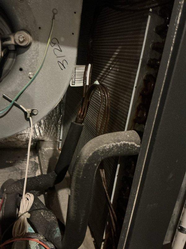 Completed annual Platinum Level maintenance on 4-year-old HVAC system during second visit. Performed comprehensive inspection of air handler components, heat exchanger coil, and refrigerant lines. Replaced 24x24x1 air filter, verified system temperatures with digital instrumentation recording 53°F supply air temperature, and inspected insulated refrigerant piping for proper operation. All equipment components found in normal operating condition with routine dust accumulation. System performance verified and customer agreement renewed.