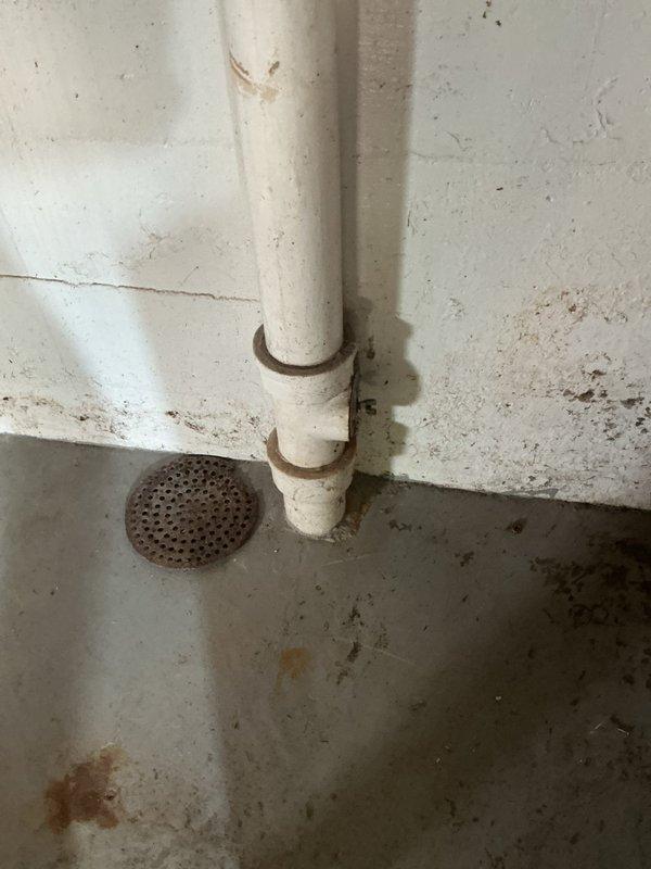 Completed initial plumbing maintenance visit and inspection of basement drainage system. Documented existing PVC drain lines, floor drain condition, and overall plumbing infrastructure for new membership enrollment.