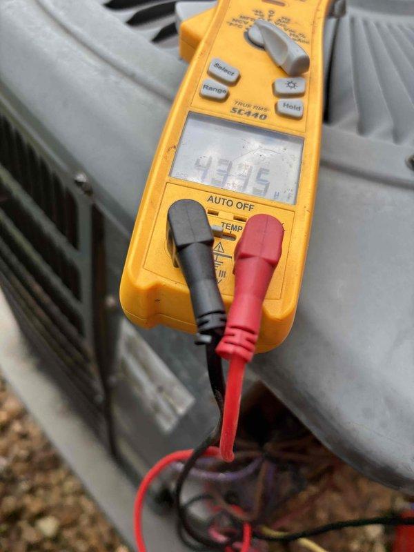 Completed planned monthly HVAC maintenance on 13-year-old system with 20x25x5 filter configuration. Performed electrical diagnostics using digital clamp meter, recording amperage reading of 19.85 amps at outdoor condensing unit. Conducted comprehensive system inspection of both indoor and outdoor equipment, documenting equipment condition and operational parameters with diagnostic instruments.