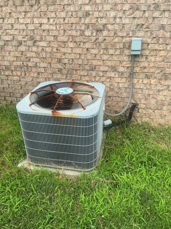 Responded to service call for air conditioning system not cooling adequately. Upon arrival, inspected 20+ year old outdoor condensing unit and associated indoor components. Evaluated overall system performance and operational efficiency. Documented existing equipment condition with photographs of outdoor condensing unit showing age-related wear and indoor mechanical space components. Assessed system functionality and provided customer with findings regarding the aging equipment's current operational status and cooling capacity limitations inherent to units of this age and condition.