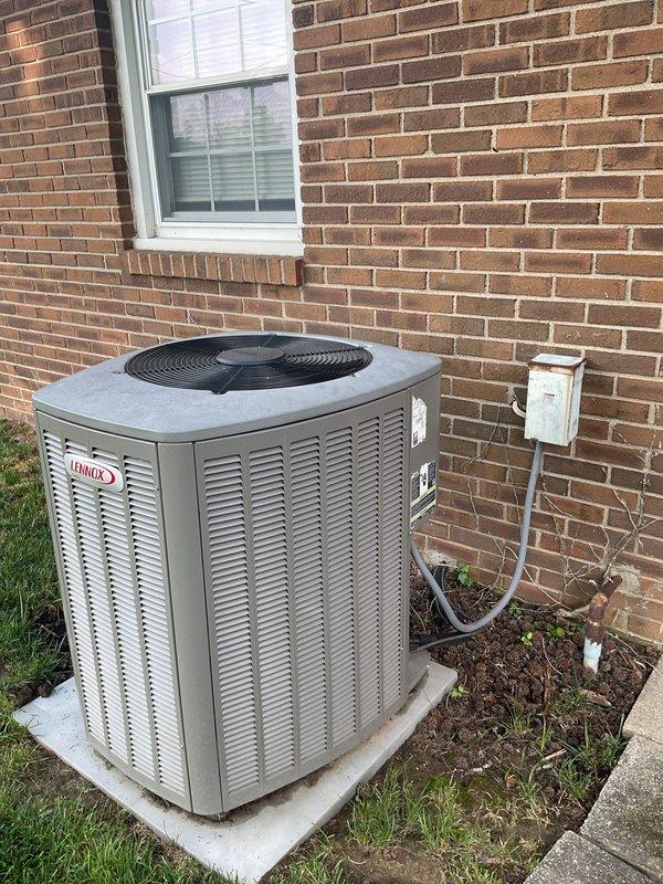 Conducted comprehensive assessment of seventeen-year-old Lennox residential air conditioning system for replacement estimate. Evaluated outdoor condenser unit positioned on concrete pad and indoor vertical air handler installed in utility closet, documenting equipment specifications, installation configuration, electrical connections, and condensate drainage system to provide accurate replacement system recommendations.