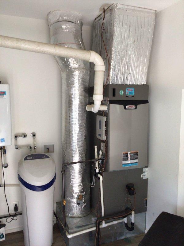 Completed Platinum Level annual maintenance on a 2-year-old Lennox HVAC system consisting of indoor air handler and outdoor condensing unit. Performed comprehensive inspection of indoor unit located in utility room, including examination of all electrical connections, refrigerant lines, and PVC condensate drainage system. Replaced 20x25x5 air filter per maintenance protocol. Inspected ductwork and noted minor wear to insulation wrapping on supply plenum. Evaluated outdoor condensing unit positioned on composite pad with proper clearances maintained from landscaping. Verified electrical disconnect functionality, checked refrigerant pressures, and confirmed proper airflow through condenser coil. Cleaned condenser coil fins and removed debris from unit perimeter. Tested system operation through complete cooling cycle, confirming proper startup sequence, temperature differential, and overall performance within manufacturer specifications. All components functioning as designed with no imme