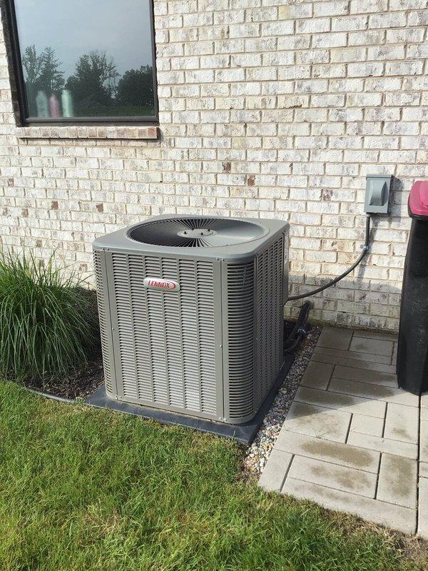 Completed Platinum Level annual maintenance on a 2-year-old Lennox HVAC system consisting of indoor air handler and outdoor condensing unit. Performed comprehensive inspection of indoor unit located in utility room, including examination of all electrical connections, refrigerant lines, and PVC condensate drainage system. Replaced 20x25x5 air filter per maintenance protocol. Inspected ductwork and noted minor wear to insulation wrapping on supply plenum. Evaluated outdoor condensing unit positioned on composite pad with proper clearances maintained from landscaping. Verified electrical disconnect functionality, checked refrigerant pressures, and confirmed proper airflow through condenser coil. Cleaned condenser coil fins and removed debris from unit perimeter. Tested system operation through complete cooling cycle, confirming proper startup sequence, temperature differential, and overall performance within manufacturer specifications. All components functioning as designed with no imme