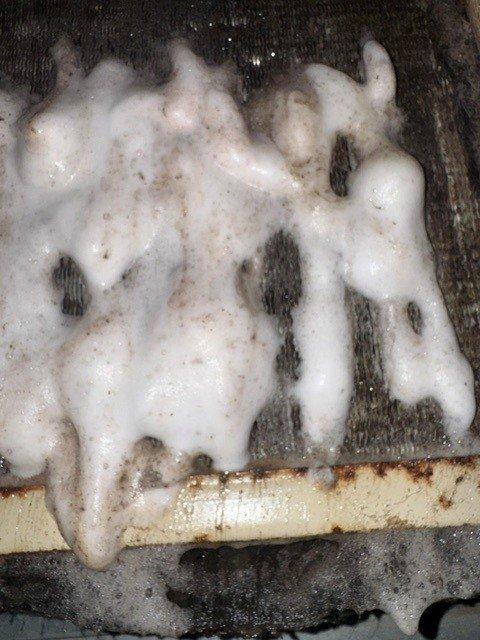 Conducted follow-up site visit to assess previously incomplete work and document current system conditions. Inspection revealed significant frost accumulation on refrigerant line with deteriorated insulation, indicating potential refrigerant flow issues or inadequate insulation coverage. Photographed insulation materials and affected copper piping with ice buildup for documentation and future reference.