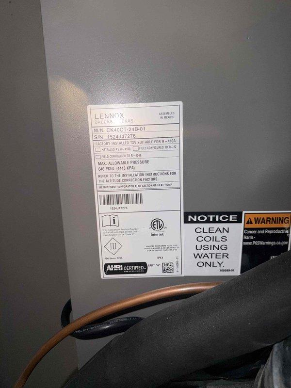 Completed installation of 2-ton, 14.7 SEER air conditioning system with matching evaporator coil. The new Lennox evaporator coil was installed above the existing Goodman furnace in the indoor closet space, with proper refrigerant line connections and condensate drainage routed through PVC piping. All components were tested and verified operational upon completion.