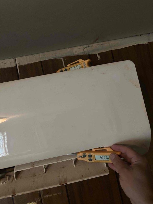 Completed annual Gold Level planned maintenance on 3-year-old mini-split system. Performed comprehensive inspection of outdoor condenser unit, noting dirt and debris accumulation on cooling coils behind protective wire guard. Took temperature differential readings at indoor air handler, recording supply air temperature of 58.6°F and return air temperature of 77.1°F, confirming proper cooling performance with 18.5°F temperature split. System operating within normal parameters with no immediate service requirements identified.
