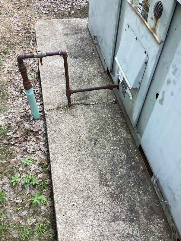 Completed comprehensive estimate for complete HVAC system replacement at residential property. Documented existing outdoor condensing unit showing significant rust staining on top surface and surrounding concrete pad, along with severely corroded refrigerant line set exhibiting extensive rust throughout U-shaped piping configuration. Provided Green - A+ tier replacement options to address aging equipment and deteriorated components requiring full system upgrade.