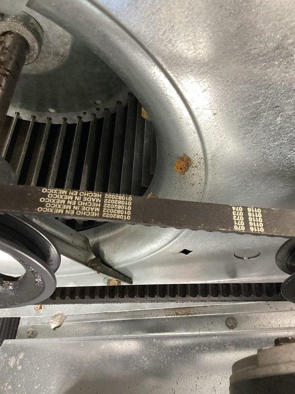 Responded to follow-up service call for 7.5-ton package unit with no cooling condition, continuing leak search from previous work order. Upon inspection, identified multiple failed electrical components requiring replacement including 2-pole contactor (40 FLA, 50 RES), two control relays, and one transformer. Photographed belt drive assembly showing normal operational wear on TORQUE-FLEX belts and pulley system. Parts ordered for installation to restore unit to operational status.