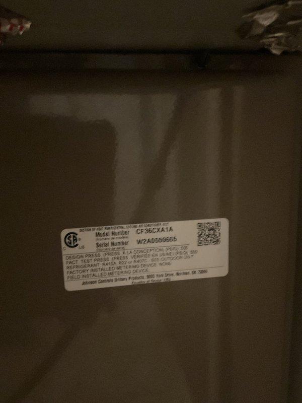 Conducted on-site assessment of existing 40-year-old air conditioning system original to 1986 construction. Documented current outdoor condenser unit model CF26C1X31A, serial number W26A0559655, and provided estimate for complete AC system replacement due to age and obsolescence of equipment.