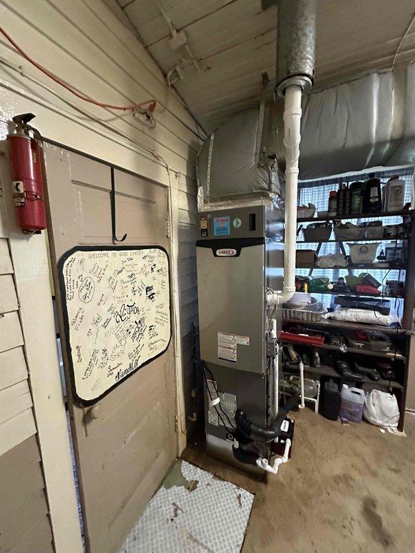# HVAC Install - Complete System

Successfully completed installation of a 3-ton, 17 SEER complete HVAC system including indoor air handler and outdoor condensing unit. 

The indoor air handler was mounted in the utility room with proper clearances for maintenance and operation. Installation included connection of supply and return ductwork using insulated flexible duct, integration of PVC condensate drainage piping, and electrical wiring to code specifications. Digital thermostat control was installed and programmed for optimal system operation.

The outdoor condensing unit was positioned on a composite equipment pad adjacent to the home's exterior wall, ensuring adequate clearance from foundation, landscaping, and windows per manufacturer specifications. Refrigerant lines were properly sized, insulated, and routed from the outdoor unit to the indoor air handler. The system was evacuated, pressure tested for leaks, and charged with refrigerant to manufacturer specifications.

All elec