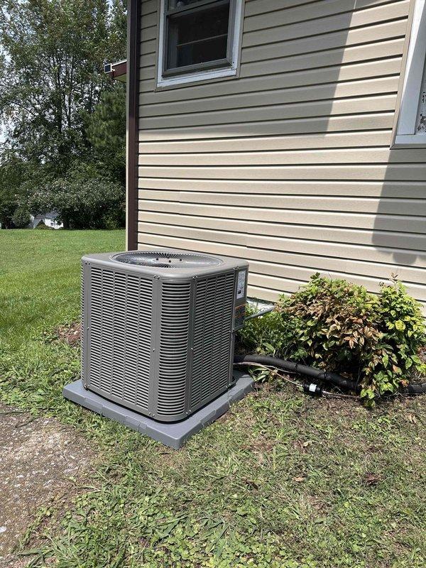 # HVAC Install - Complete System

Successfully completed installation of a 3-ton, 17 SEER complete HVAC system including indoor air handler and outdoor condensing unit. 

The indoor air handler was mounted in the utility room with proper clearances for maintenance and operation. Installation included connection of supply and return ductwork using insulated flexible duct, integration of PVC condensate drainage piping, and electrical wiring to code specifications. Digital thermostat control was installed and programmed for optimal system operation.

The outdoor condensing unit was positioned on a composite equipment pad adjacent to the home's exterior wall, ensuring adequate clearance from foundation, landscaping, and windows per manufacturer specifications. Refrigerant lines were properly sized, insulated, and routed from the outdoor unit to the indoor air handler. The system was evacuated, pressure tested for leaks, and charged with refrigerant to manufacturer specifications.

All elec
