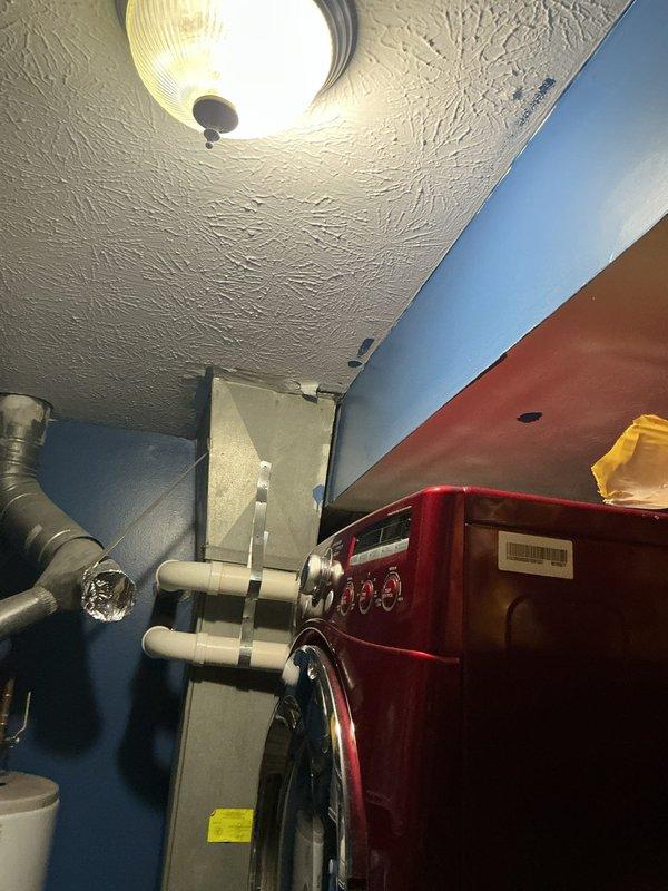 Responded to no cooling complaint on one-year-old system blowing warm air with thermostat set to 68°F but reading 74°F. Performed diagnostic evaluation of HVAC system, confirmed adequate airflow through vents, verified no tripped breakers or evaporator coil freeze-up present. Documented system conditions and captured photos of installation area for service records.