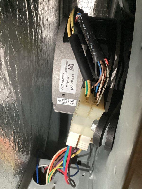Responded to callback for intermittent short cycling issue on heat pump system model ASPT37C14AC. Previous visits were unable to observe the problem, but customer documented the unit short cycling with home temperature reaching 80 degrees. Upon arrival, inspected system operation, reviewed error codes, and examined ECM blower motor and associated wiring connections. Photographed ECM motor assembly and unit data plate for warranty part ordering documentation. Determined ECM fan motor replacement required to resolve short cycling condition. System currently operational but part needed for permanent repair. Estimated 2 hours for motor replacement upon part arrival.