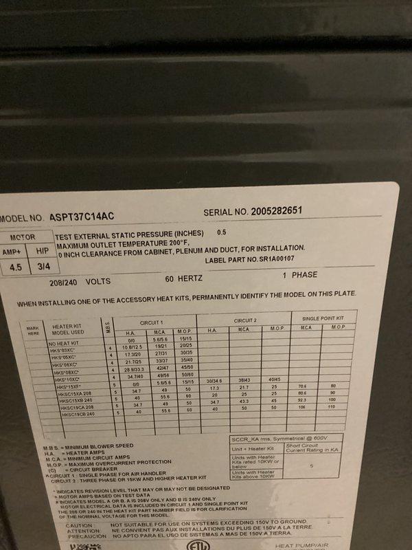 Responded to callback for intermittent short cycling issue on heat pump system model ASPT37C14AC. Previous visits were unable to observe the problem, but customer documented the unit short cycling with home temperature reaching 80 degrees. Upon arrival, inspected system operation, reviewed error codes, and examined ECM blower motor and associated wiring connections. Photographed ECM motor assembly and unit data plate for warranty part ordering documentation. Determined ECM fan motor replacement required to resolve short cycling condition. System currently operational but part needed for permanent repair. Estimated 2 hours for motor replacement upon part arrival.