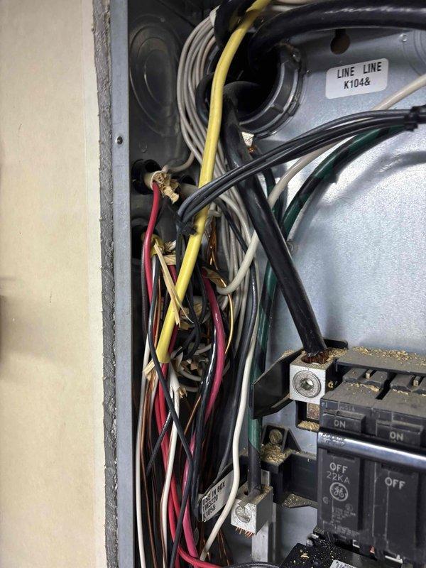 Replaced failed compressor on HVAC system with parts supplied by United Refrigeration. Documented electrical panel configuration and circuit directory showing dual A/C compressor circuits, heat pump, and air handler connections prior to component replacement. Completed compressor changeout and verified proper electrical connections and system operation.