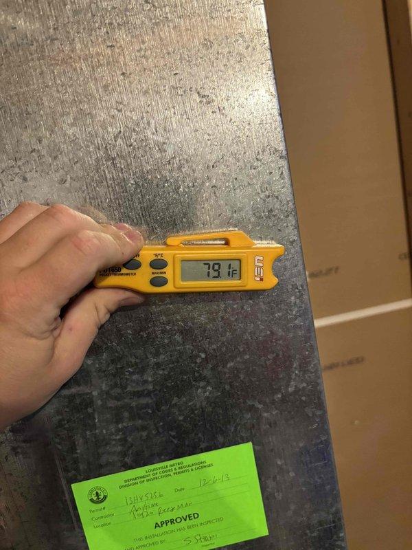 Responded to callback for air conditioning system not cooling properly. Upon arrival, confirmed inadequate cooling with supply air temperature measuring 79.1°F at the ductwork. Performed electrical diagnostics on outdoor condensing unit, measuring compressor amperage at 0.96 amps, which indicates the compressor is not running under normal load conditions. Identified electrical or mechanical failure preventing proper compressor operation. System requires further diagnosis to determine root cause of compressor malfunction, which may include failed start components, refrigerant issues, or internal compressor failure. Documented findings with thermal and electrical measurements for follow-up service requirements.