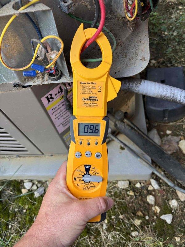 Responded to callback for air conditioning system not cooling properly. Upon arrival, confirmed inadequate cooling with supply air temperature measuring 79.1°F at the ductwork. Performed electrical diagnostics on outdoor condensing unit, measuring compressor amperage at 0.96 amps, which indicates the compressor is not running under normal load conditions. Identified electrical or mechanical failure preventing proper compressor operation. System requires further diagnosis to determine root cause of compressor malfunction, which may include failed start components, refrigerant issues, or internal compressor failure. Documented findings with thermal and electrical measurements for follow-up service requirements.