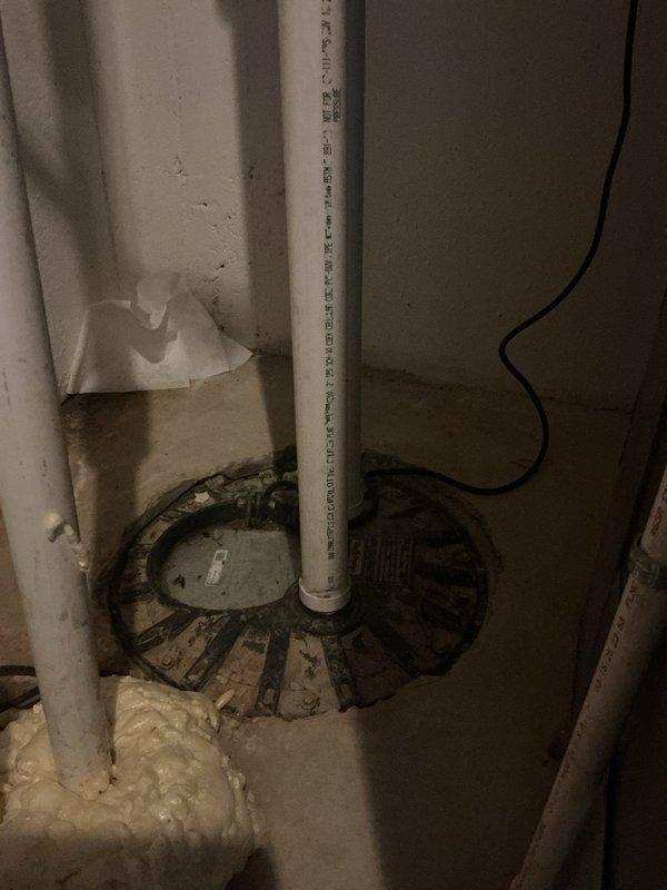 Responded to service call for spigot installation and plumbing system evaluation. Inspected and verified proper installation of PEX water supply lines with brass fittings, including blue hot and cold water lines with appropriate shutoff valves and connections. Confirmed floor drain functionality and drainage system integrity in utility area, ensuring all plumbing components met code requirements and operated correctly.
