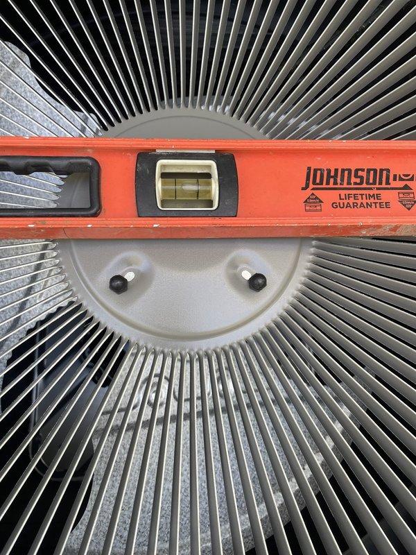 Completed full HVAC system installation including outdoor condenser unit placement on concrete pad. Unit was properly leveled and positioned per manufacturer specifications, with all components verified for correct installation and operational readiness.