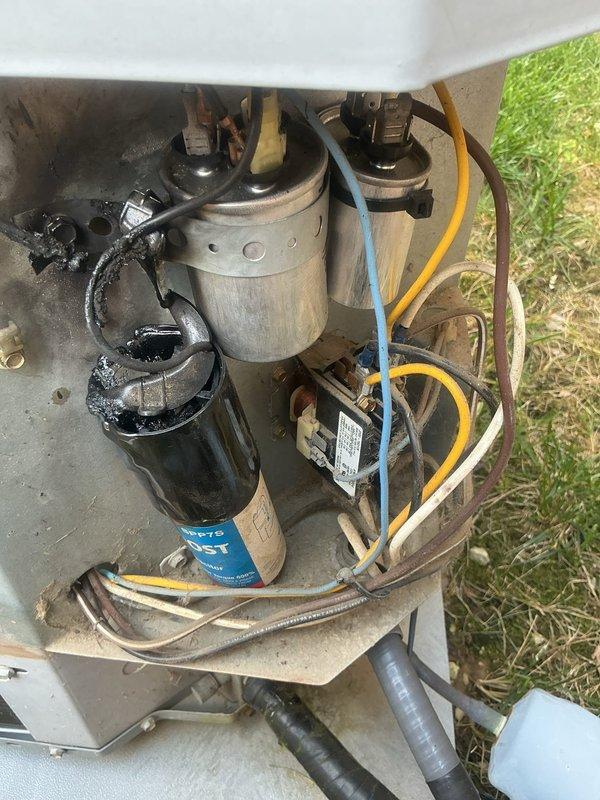 Responded to no-cool complaint on 21+ year old system unable to maintain temperature, with thermostat set to 74°F but home reaching 80s. Performed diagnostic evaluation of outdoor unit electrical components including dual run capacitors, contactor, and associated wiring. Conducted comprehensive load calculation analysis showing heating requirement of 50,658 BTUh with 658 CFM airflow and cooling requirement of 32,614 BTUh total load (27,433 BTUh sensible, 5,181 BTUh latent) requiring 1,219 CFM, indicating system is significantly undersized for current load demands given age and degraded efficiency of equipment.