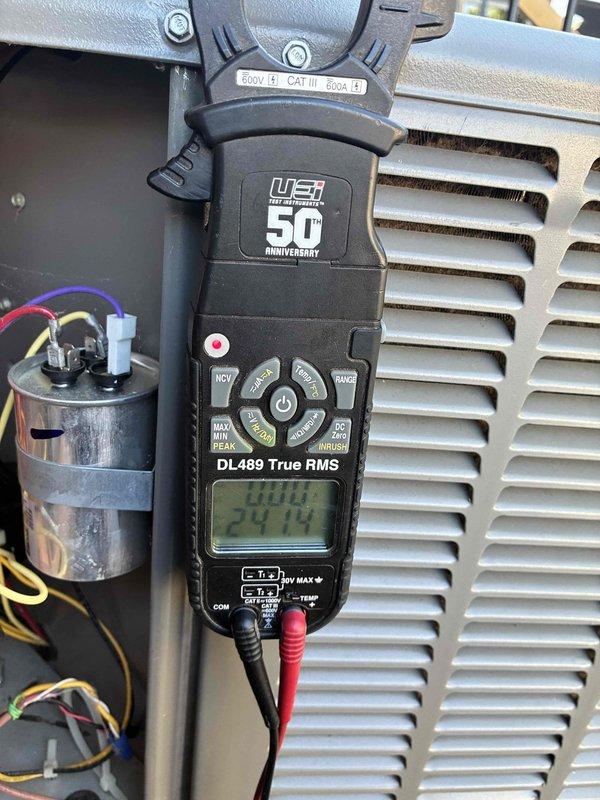Completed scheduled HVAC maintenance tune-up on residential system. Performed comprehensive electrical diagnostics using digital multimeter, measuring voltage at 374.4V and verifying amperage draws at outdoor condensing unit. Tested capacitor functionality and inspected all electrical connections, confirming proper operation of all components.