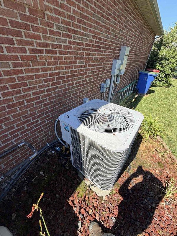 Completed scheduled AC tune-up and maintenance on 12-year-old residential cooling system. Performed comprehensive inspection of outdoor condensing unit and indoor air handling components, documented equipment dimensions and clearances, verified proper operation of all mechanical systems, and replaced 20x20x5 air filter. System operating within normal parameters with no immediate service needs identified at this time.