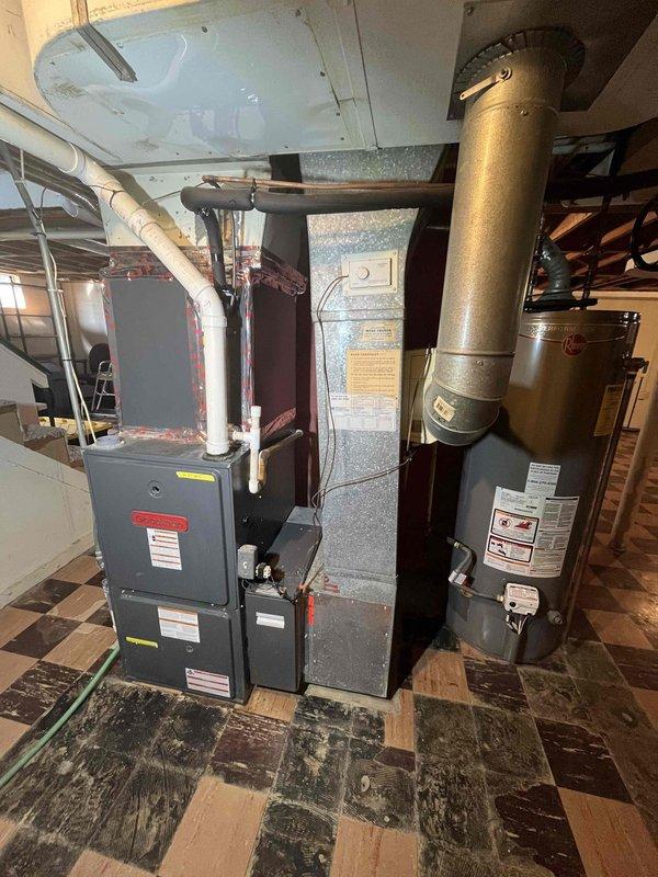 Conducted indoor air quality assessment for residential HVAC system in basement mechanical room. Evaluated existing furnace and ductwork configuration to determine optimal placement for air scrubber and UV light installation. Inspected current equipment setup, including furnace unit with PVC venting, air handler components, and thermostat system to ensure compatibility with requested IAQ upgrades. Documented equipment specifications and existing conditions to provide comprehensive estimate for air purification enhancement system installation.