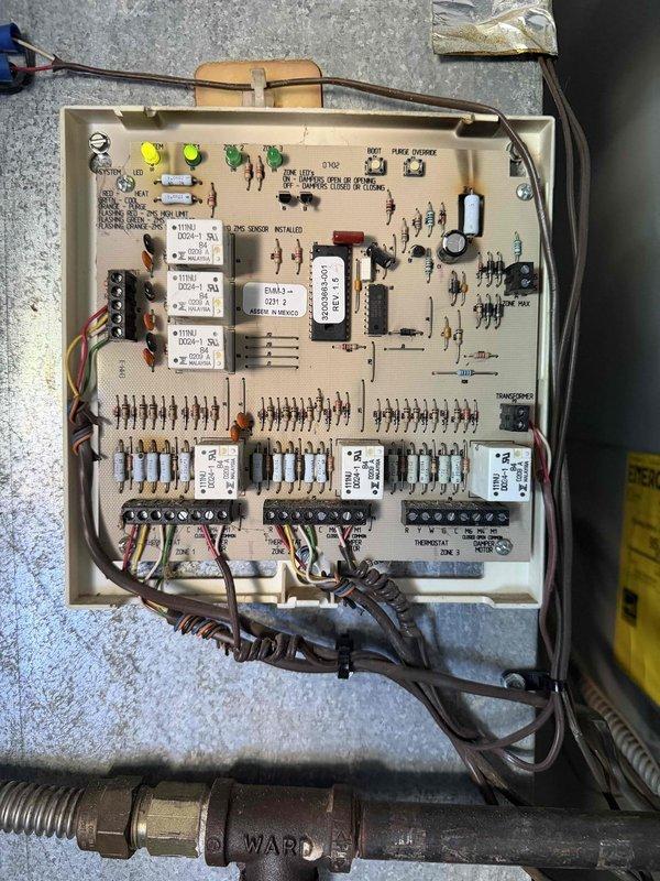 Responded to no cooling call on 3-year-old multi-zone HVAC system where thermostat was randomly switching between cooling and heating modes and failing to maintain setpoint of 70°F. Inspected zone control panel and main system control board, verified proper wiring connections across all three zones, and checked thermostat communication circuits. Diagnosed malfunctioning zone control board causing erratic thermostat behavior and improper mode switching. Replaced defective zone control module, verified proper thermostat response across all zones, and confirmed system now maintaining programmed temperature setpoints with stable cooling operation.