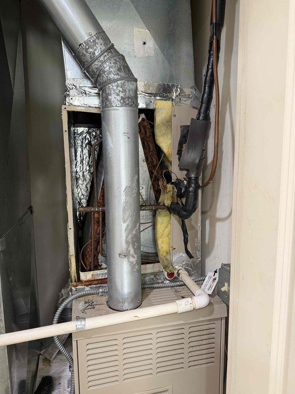 Provided complimentary second opinion on older upstairs HVAC system after previous contractor diagnosed failed evaporator coil weld requiring R-22 refrigerant recharge through home warranty claim. Performed visual inspection of Lennox furnace unit and associated ductwork, examining evaporator coil assembly, refrigerant lines, and system components to verify reported weld failure and assess overall system condition.