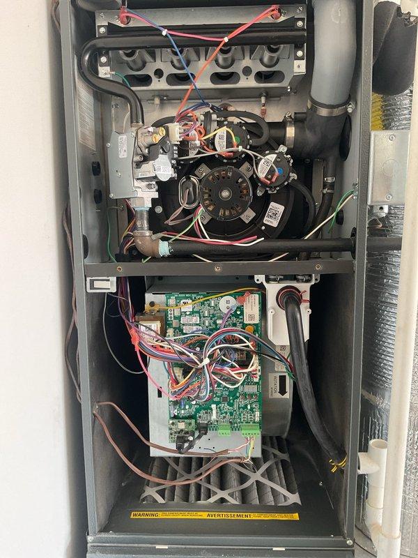 Completed Platinum Level planned maintenance on a 5-year-old Goodman HVAC system with 16x25x5 filter specifications. Performed comprehensive inspection of all internal components including blower motor assembly, electrical connections, control board, and heat exchanger, verifying proper operation and documenting system condition with interior cabinet photographs showing all major components accessible and functioning within normal parameters.