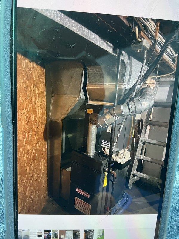 Conducted comprehensive HVAC replacement estimate for existing Goodman system struggling to maintain adequate heating and cooling capacity. Evaluated current 2-ton Goodman furnace installation with A-coil configuration located in utility space, documenting existing ductwork layout, flexible metallic duct connections, and system accessibility. Assessed installation area conditions including wooden framing, available workspace clearances, and existing mechanical infrastructure to determine optimal replacement specifications. Photographed current equipment positioning, duct routing, and mechanical room configuration to develop accurate replacement proposal for new 2-ton Goodman system with A-coil assembly.